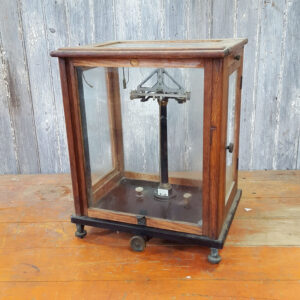 Antique Balance Scales in Glass Cabinet