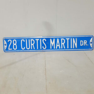 American 28 Curtis Martin Drive Sign