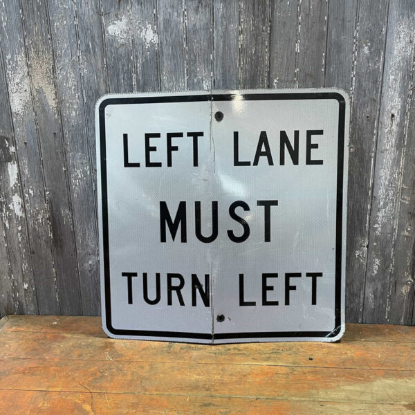 Left Lane Must Turn Left Road Sign