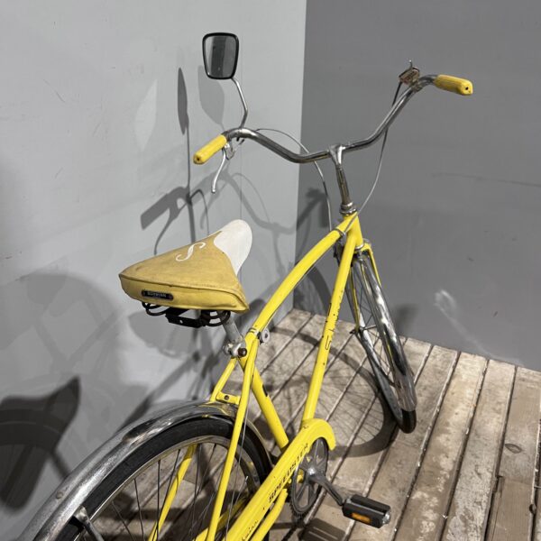 Yellow Schwinn Speedster Bike