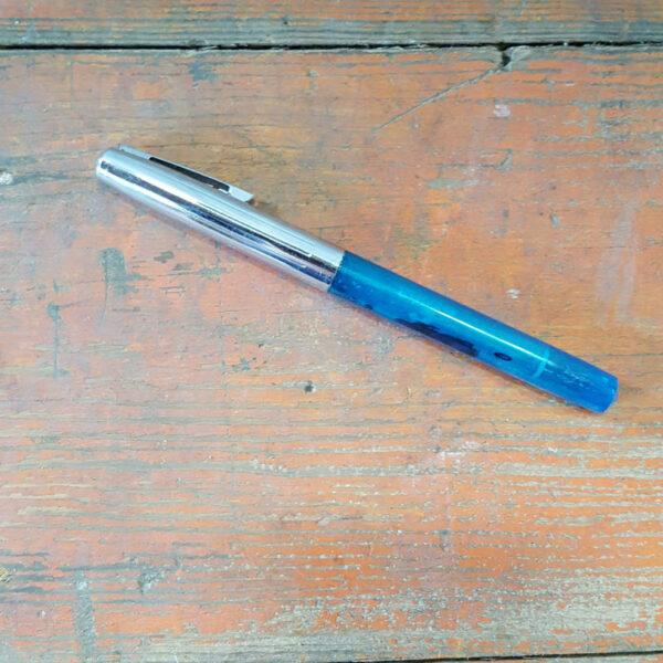 Blue Pen and lid