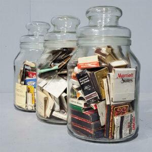 Glass Jars Filled With Matchbooks